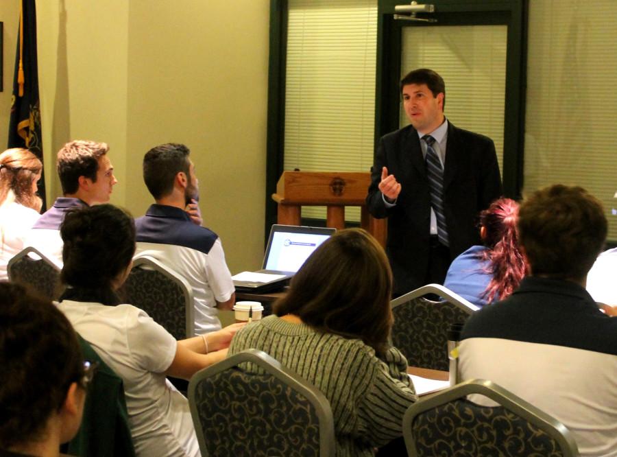 David Dausey, Ph.D., addresses Mercyhurst Student Government about calendar changes.