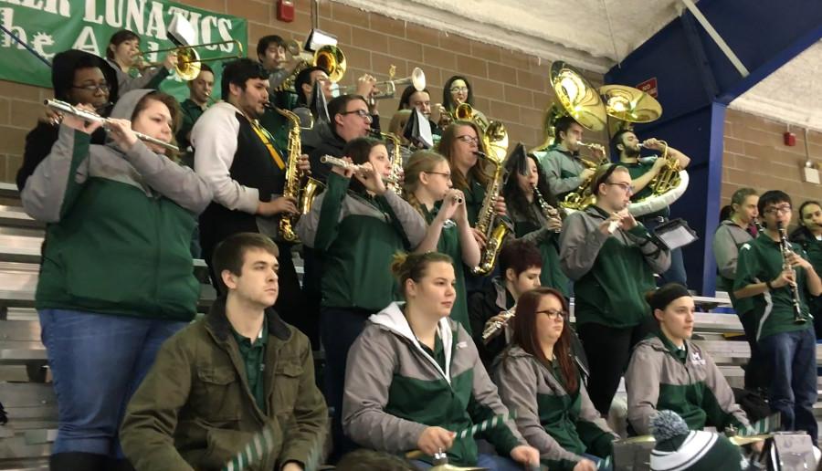 The Mercyhurst University Athletic Band performs at a women’s hockey game. The band will be marching at football games in the fall of 2016.
