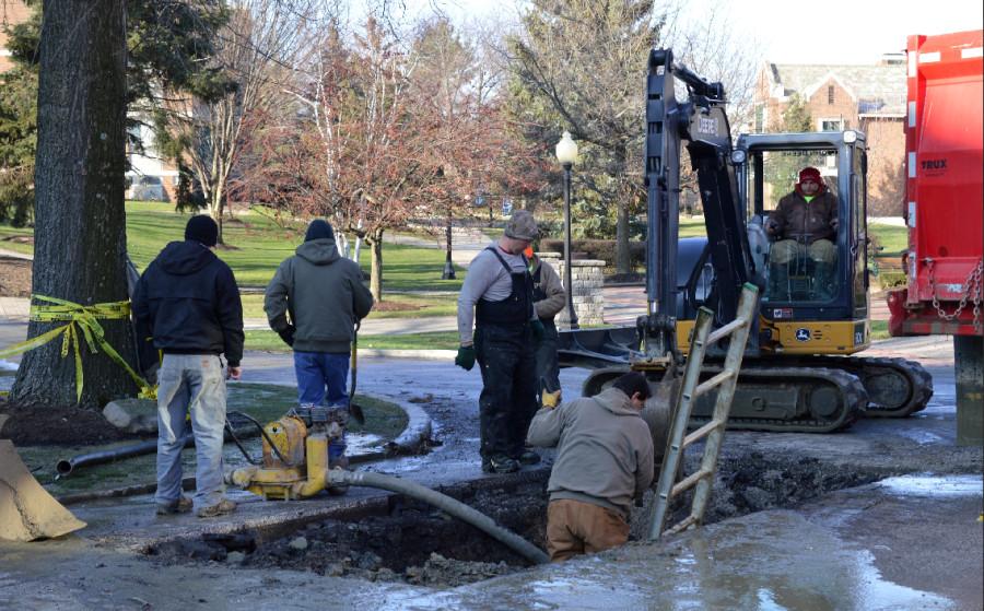 Repair crews work to repair the water main break that occurred on campus this week. 