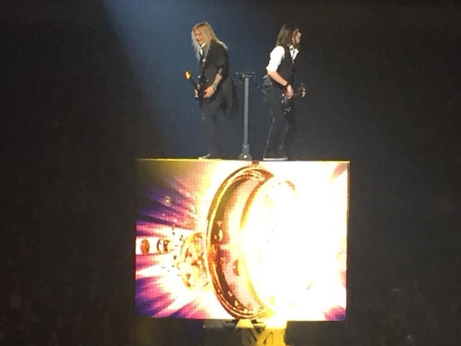 Two of the members of the Trans-Siberian Orchestra perform at Erie Insurance Arena on Nov. 16. 