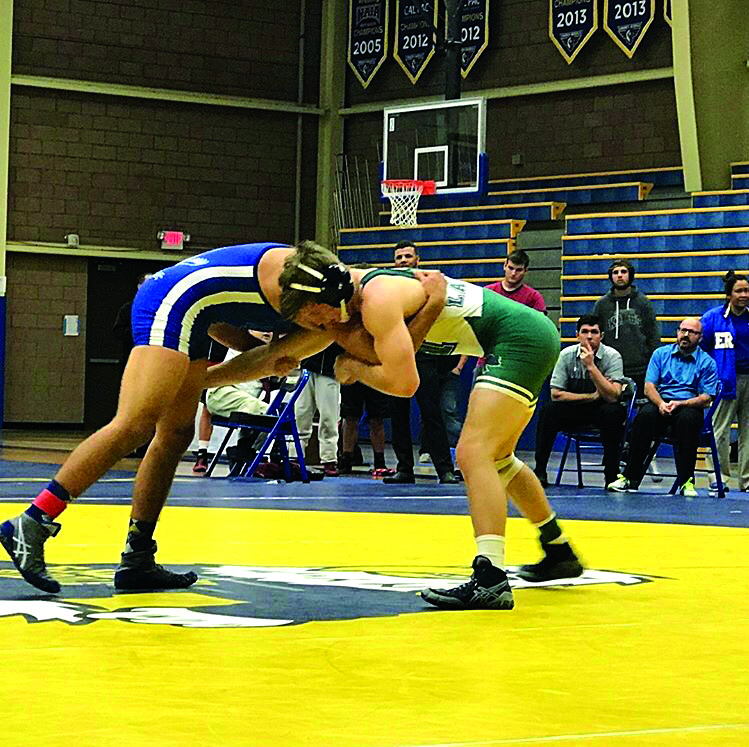 Owen Watkins grapples with an opponent from Embry-Riddle Aeronautical University.