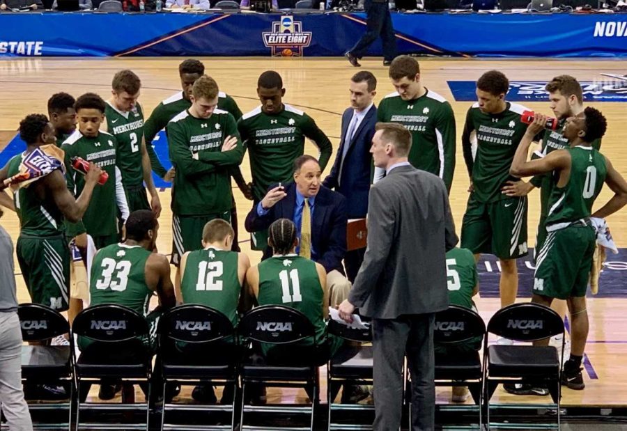 Seated from right, Mercyhurst’s Patrick Smith, Nicholas Lang, Nelson Maxwell, and Trystan Pratapas listen to Head Coach Gary Manchel during the Elite 8 game against Northwest Missouri State.