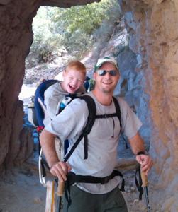 mercyhurst.com photo: Brad McGarry hikes the canyon with his son.