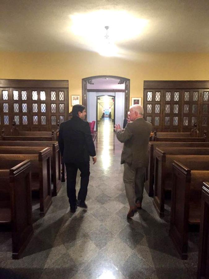 David Dasuey, Ph.D., and Maccabe walk through Christ the King Chapel during Maccabe’s visit to Mercyhurst. 
