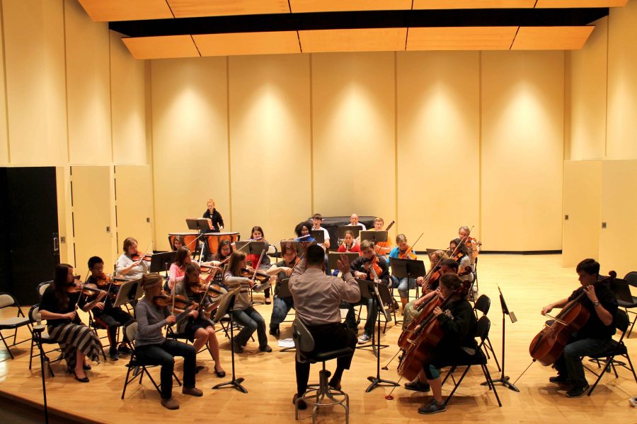 The Chamber Orchestra, led by Jonathan Moser, rehearsing for their upcoming concert. 