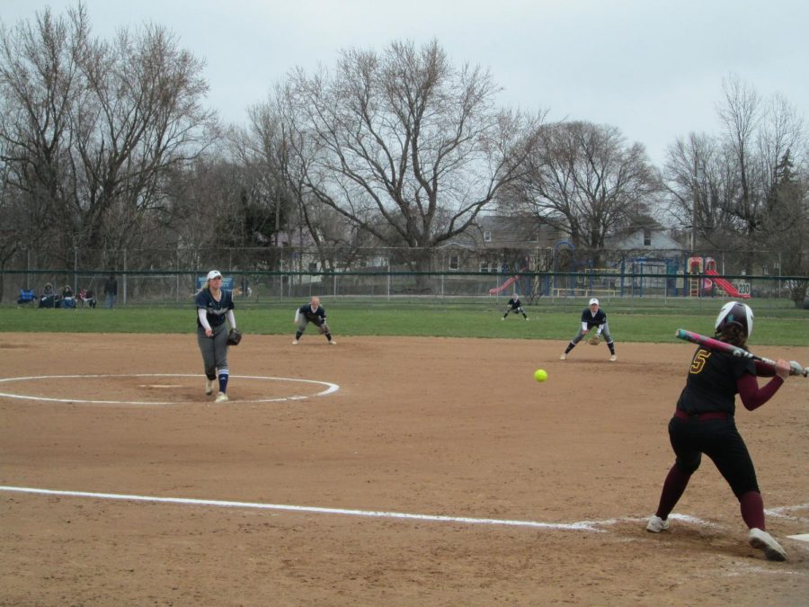 The Lakers’ Tori Pierucci, left, pitches a ball to the Golden Knights’ Kristina DeMatteis, at bat, during the fourth inning of Saturday’s first game.  The Lakers swept 2-0, but fell 1-5 in game two.