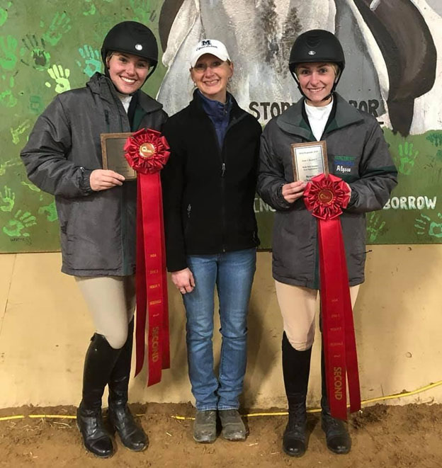 From left, sophomore Hunter Reiff, Equestrian team coach Halli Bidwell and junior Alyssa Reedy pose, with both riders displaying their respective awards for this season.