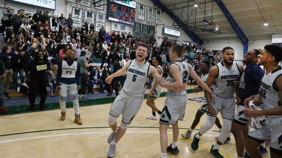 Mercyhurst University’s No. 5 Trystan Pratapas celebrates with the team after his game-winning three-pointer seconds before the final buzzer.