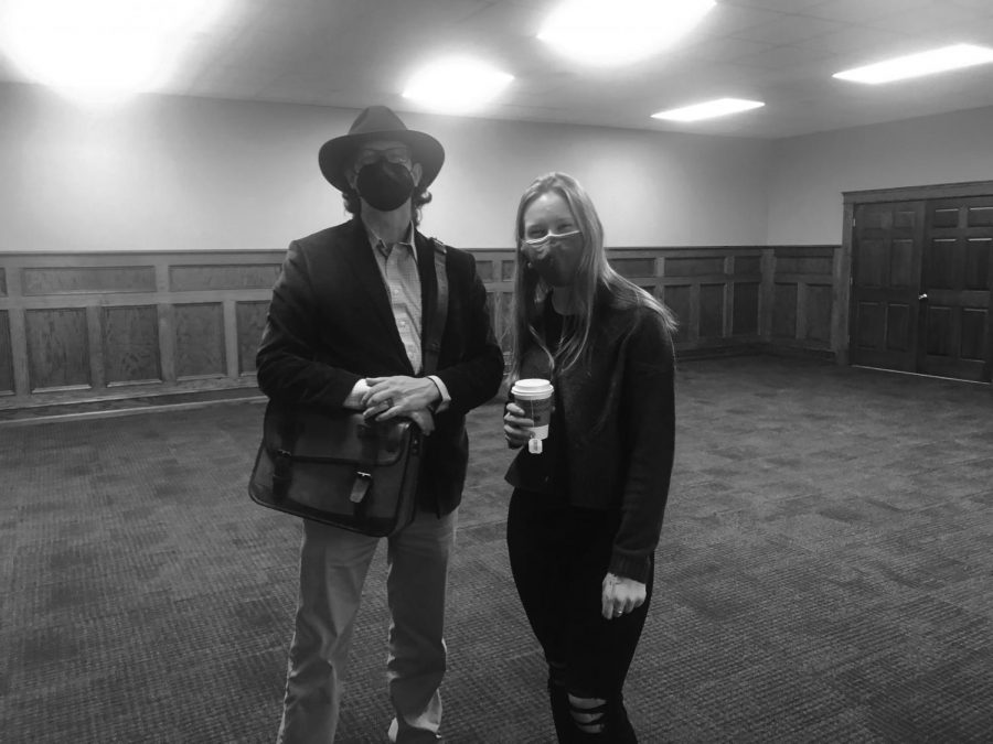 Dr. Gregory Brown and student Megan Siegfried conversing over tea and snacks at the Victorian Tea event on April 21 at the Mercy Heritage Room. 