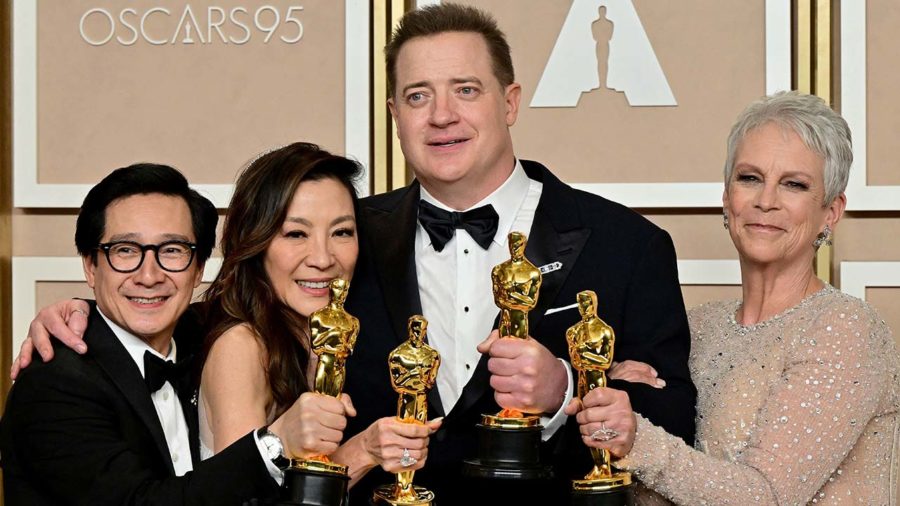 From left, Ke Huy Quan, Michelle Yeoh, Brenden Fraser and Jamie Lee Curtis with their Oscar awards.